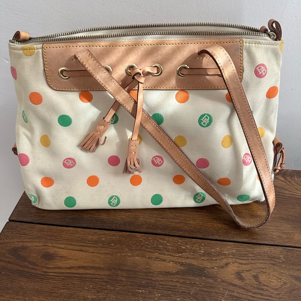 Cream and colored polka dot Dooney and Bourke bag